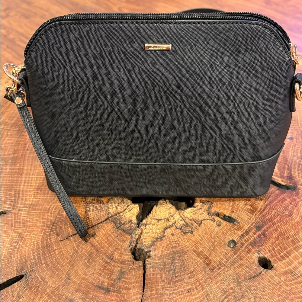 Black Crossbody Bag with Gold Accents and Structured Design